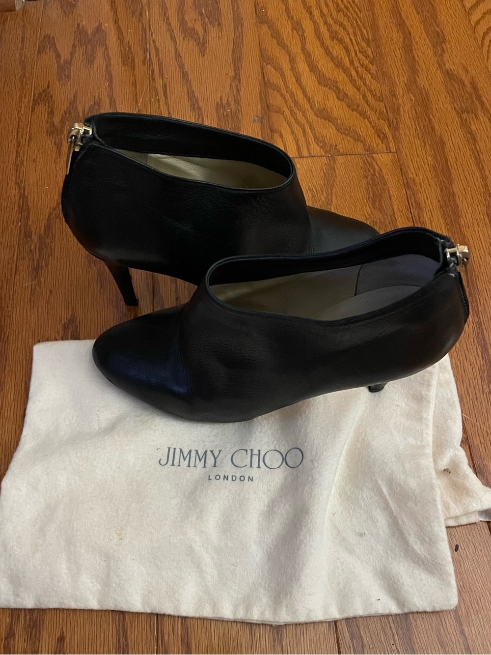 👠 Jimmy Choo 👠 Black Leather Ankle Booties with Gold Zip Accent